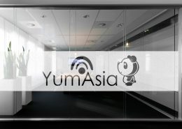 Yum Asia logo on a window