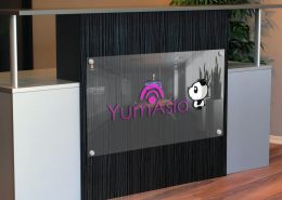 Yum Asia logo on a desk