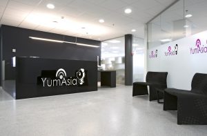Yum Asia logo in an office