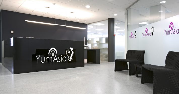 Yum Asia logo in an office