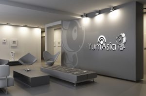 Yum Asia logo on a wall